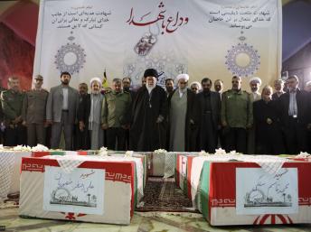 2011-11-14T115002Z_1052587691_GM1E7BE1JBK01_RTRMADP_3_IRAN-BLAST-FUNERAL.jpg