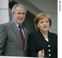 AP_President_Bush_greets_German_Chancellor_Angela_Merkel_Germany_at_the_start_of_G8_Summit_6jun07_eng_1951.jpg